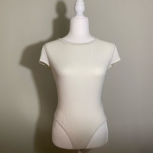 Off white ribbed bodysuit-Clasp on bottom. Worn 2x